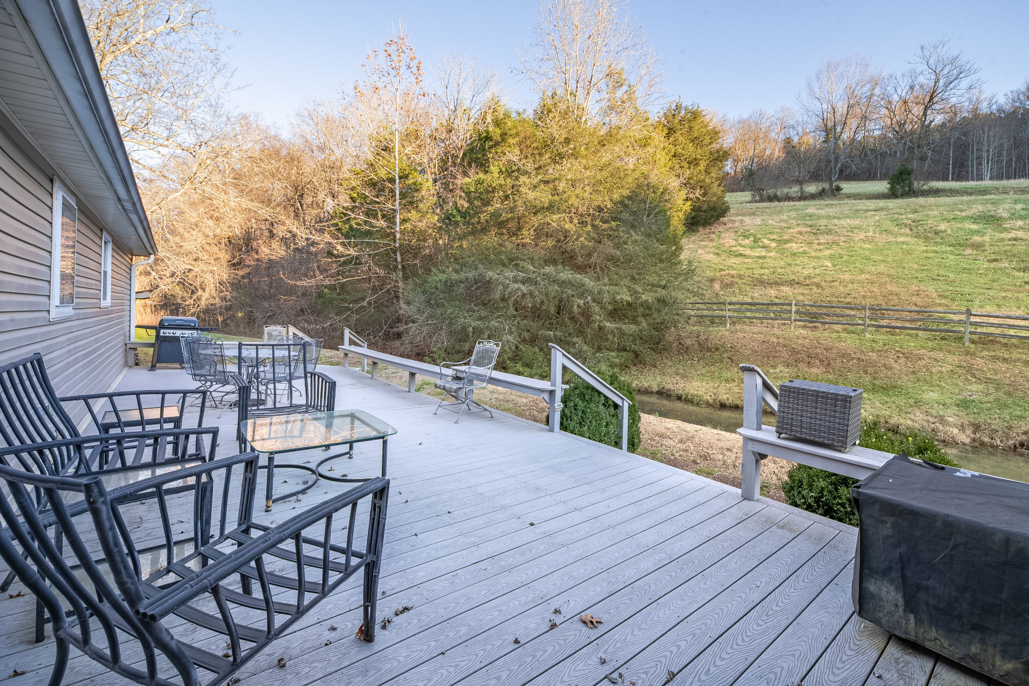 3580 Blue Creek Road Lynnville, TN 38472 - Photo 62 of 90 a view of a chairs and table on the wooden deck