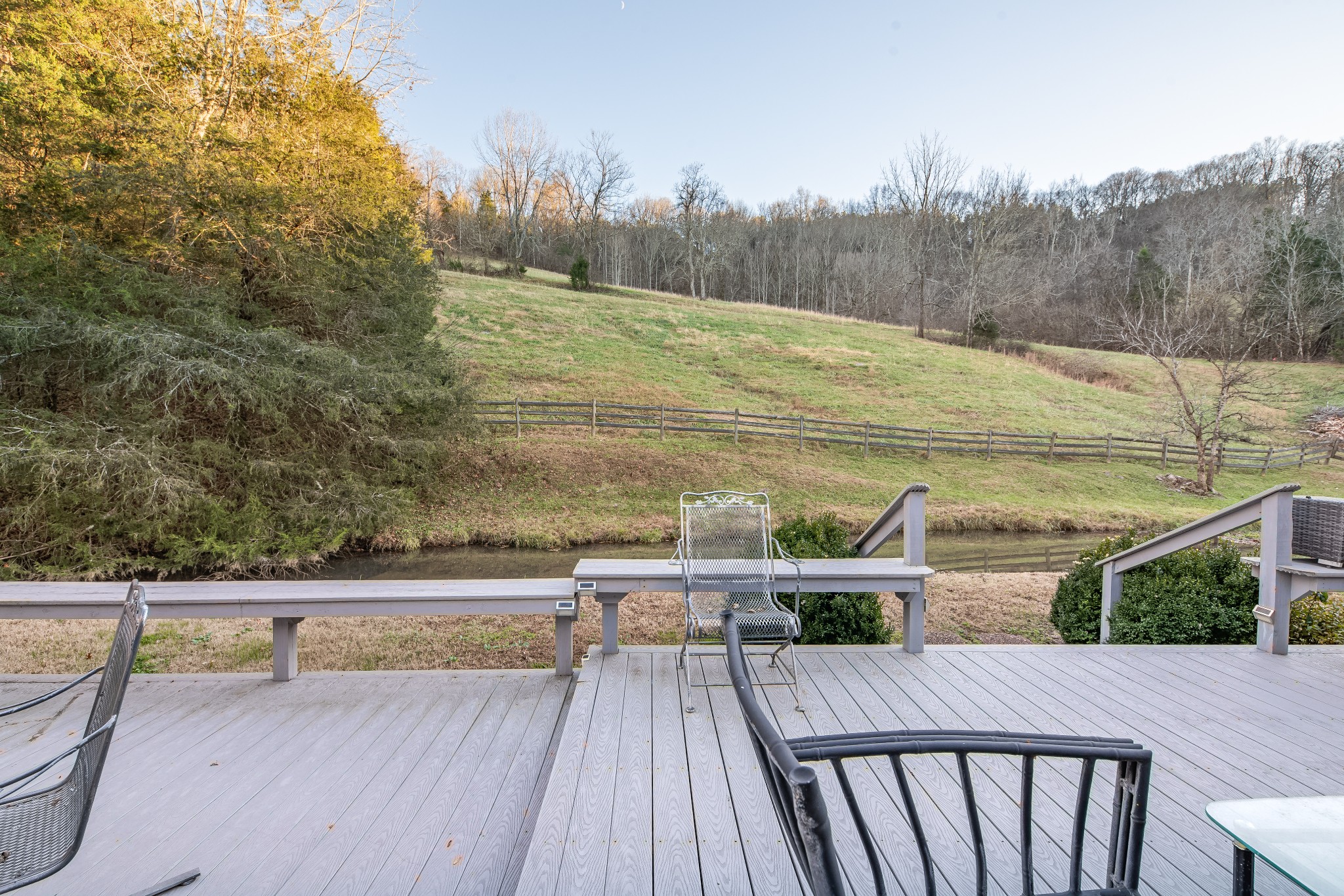 3580 Blue Creek Road Lynnville, TN 38472 - Photo 63 of 90 a view of a balcony with wooden floor and fence next to a yard