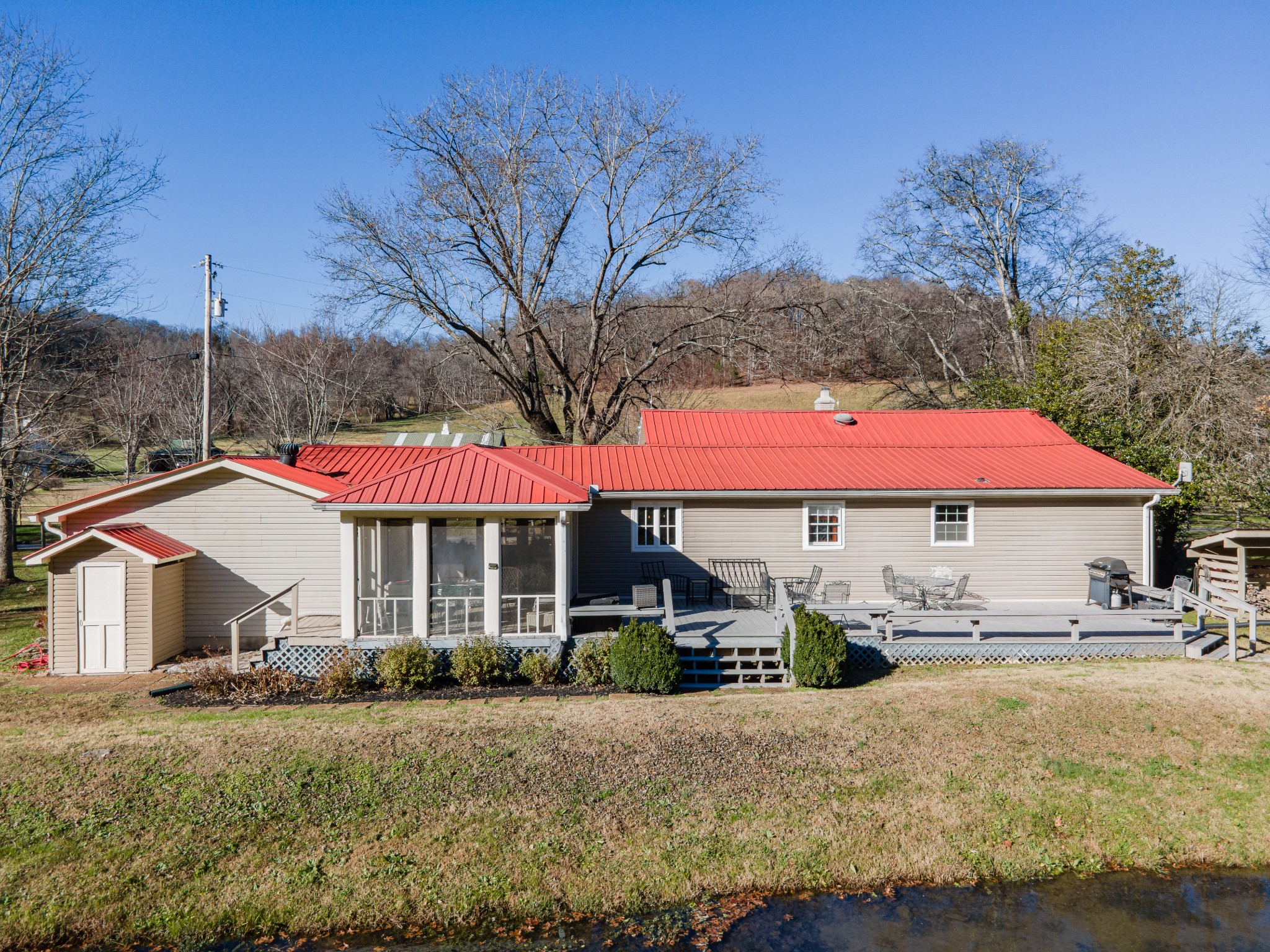 3580 Blue Creek Road Lynnville, TN 38472 - Photo 71 of 90 a view of a house with a yard patio and fire pit