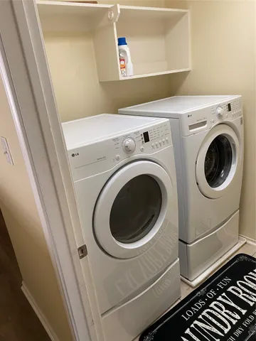a utility room with dryer and washer