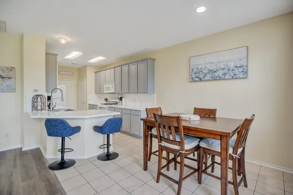 a view of a dining room with furniture