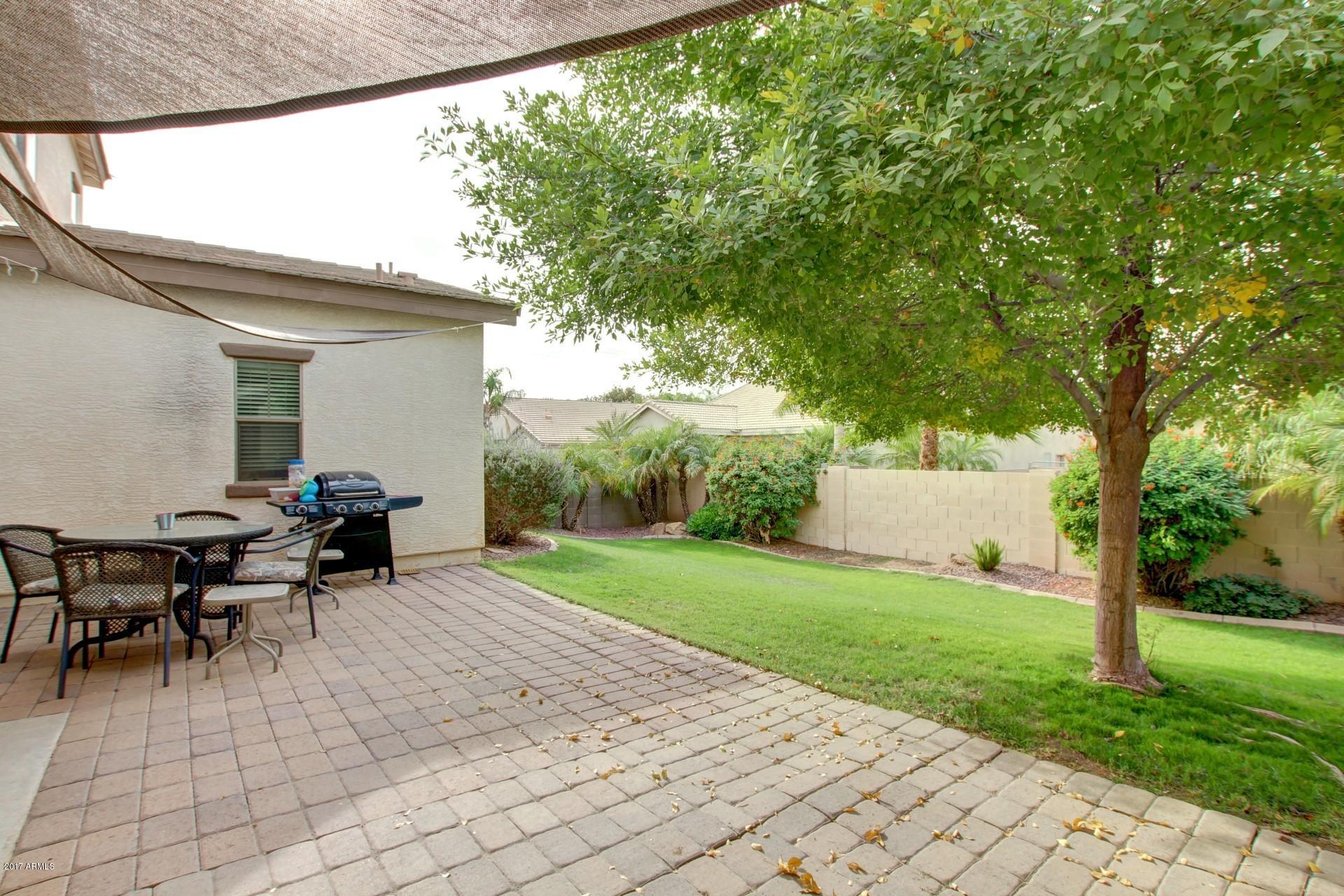 462 North Citrus Lane Gilbert, AZ 85234 - Photo 29 of 44 Paved back patio with sun shades