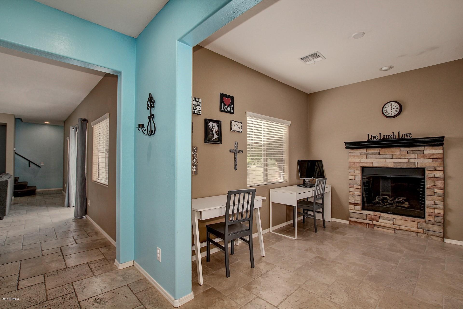 462 North Citrus Lane Gilbert, AZ 85234 - Photo 5 of 44 Family room w/ fireplace