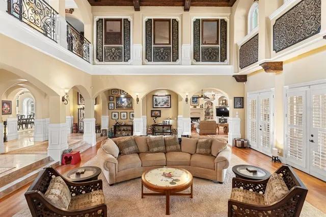 a view of a dining room with furniture and window