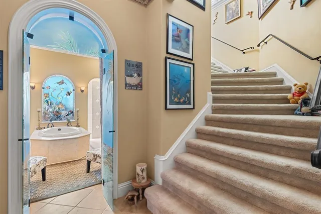 a bathroom with a bathtub and shower