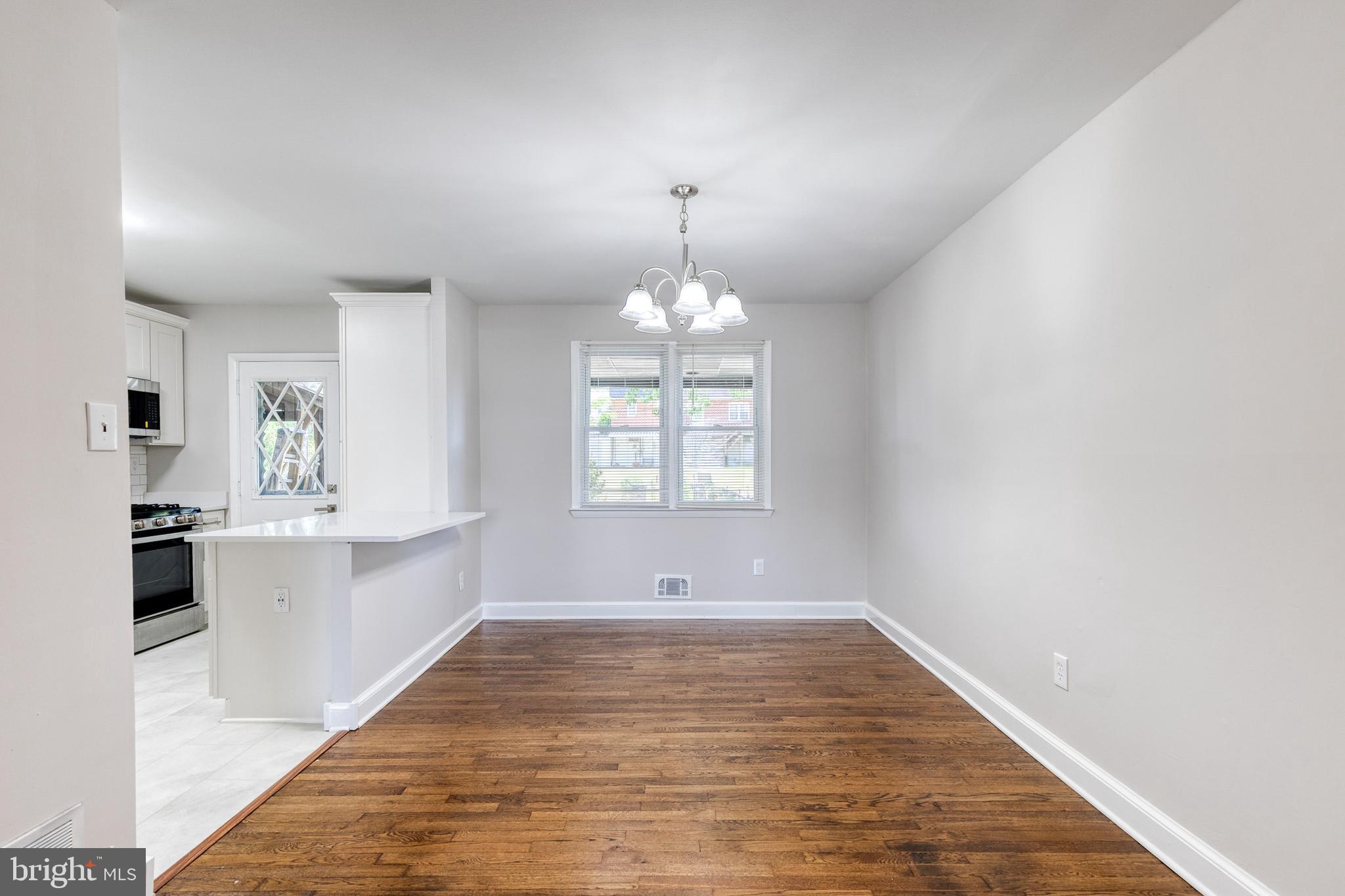 5649 Utrecht Road Baltimore, MD 21206 - Photo 9 of 42 a view of an empty room and window