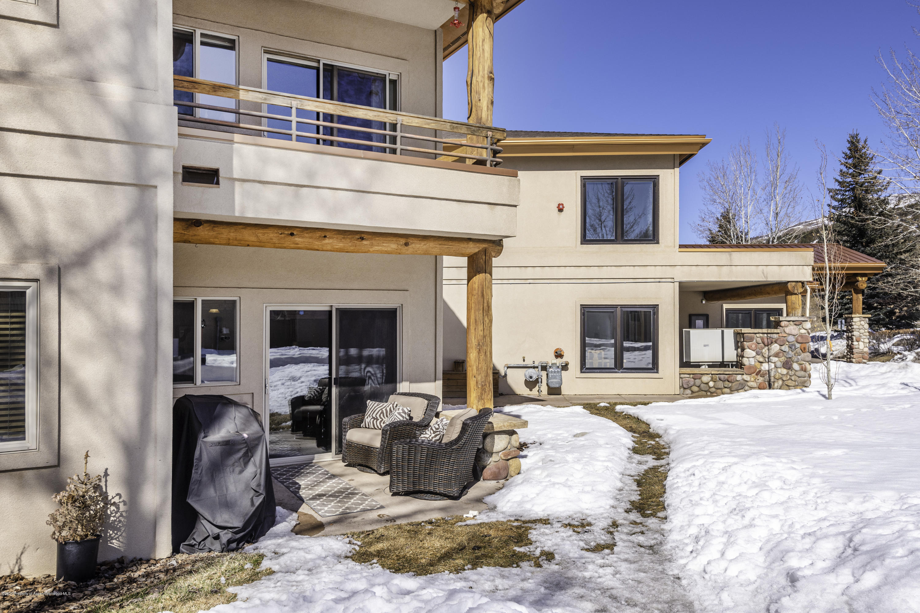 1400 East Valley Road, Unit 110 Basalt, CO 81621 - Photo 1 of 10 front view of a building with a patio