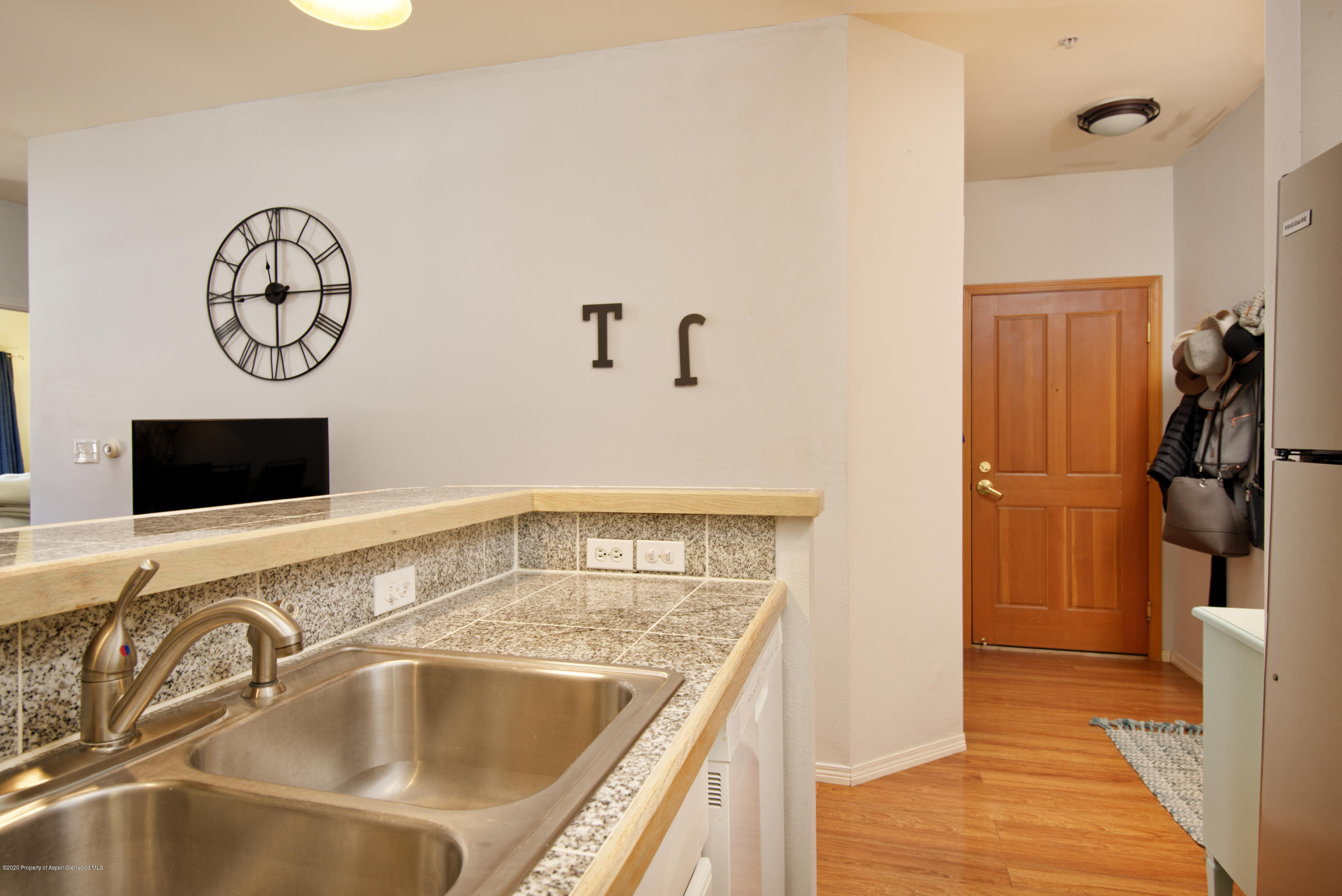 1400 East Valley Road, Unit 110 Basalt, CO 81621 - Photo 5 of 10 a bathroom with a sink and a mirror