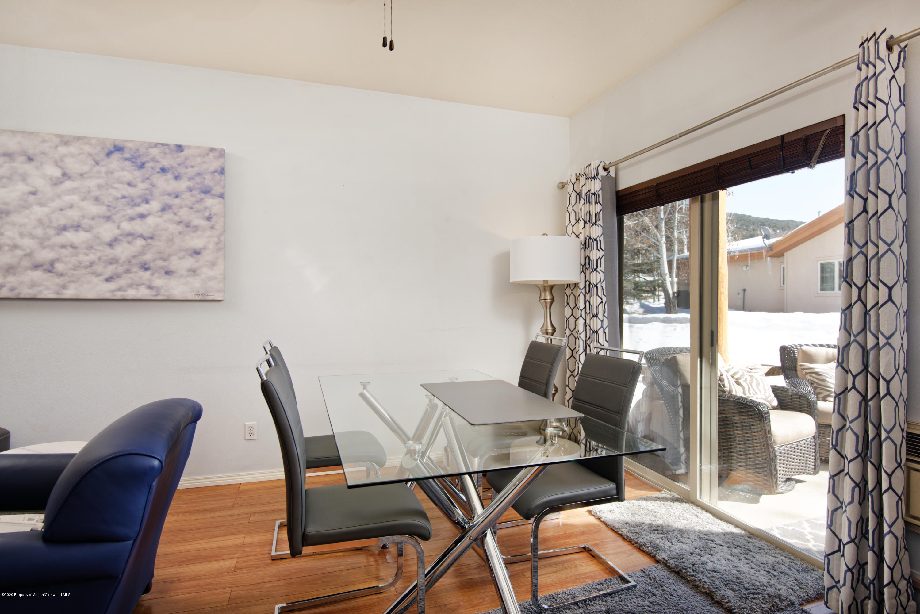 1400 East Valley Road, Unit 110 Basalt, CO 81621 - Photo 6 of 10 a work room with furniture and wooden floor