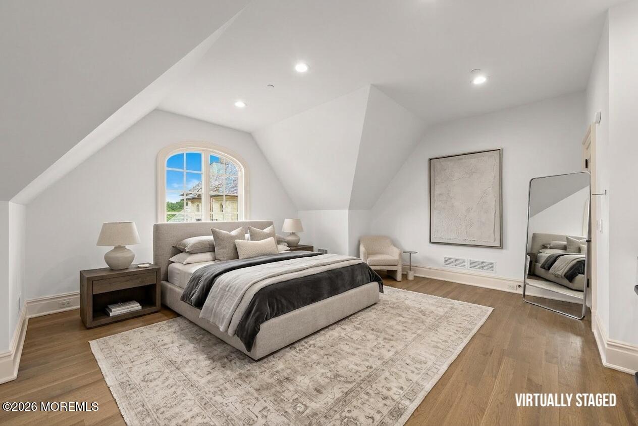88 Montrose Road Colts Neck, NJ 07722 - Photo 46 of 73 a bedroom with a bed and a couch