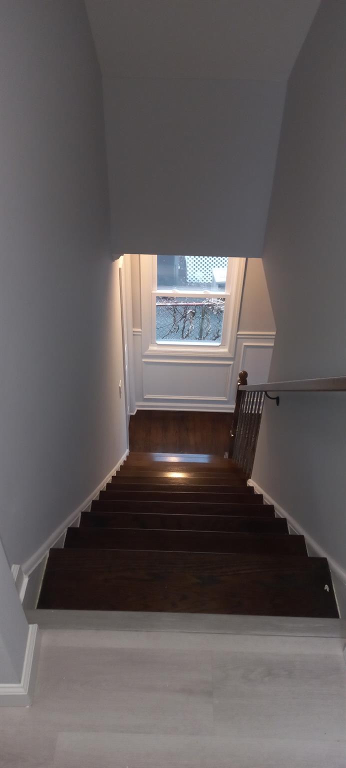 3 Hampton Road Lynbrook, NY 11563 - Photo 21 of 23 Stairway featuring wood finished floors