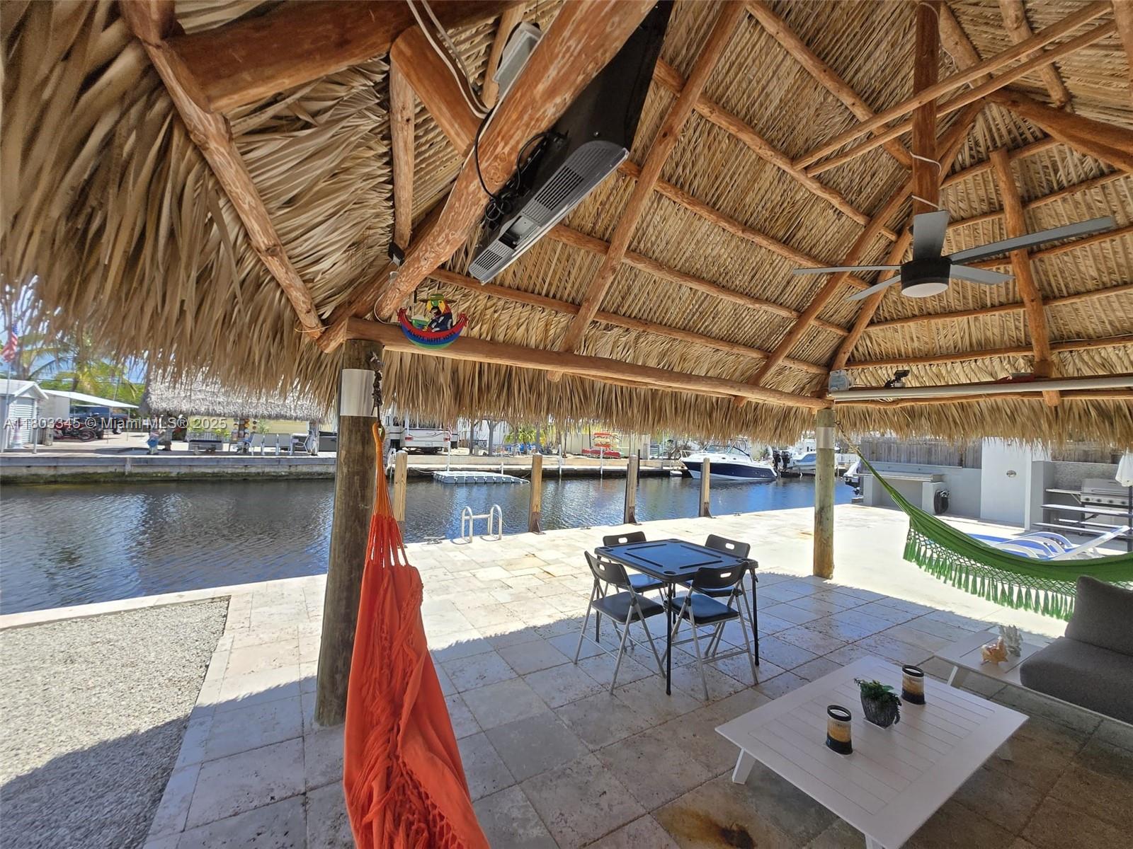 271 Lance Lane Key Largo, FL 33037 - Photo 12 of 33 a view of a swimming pool with outdoor seating