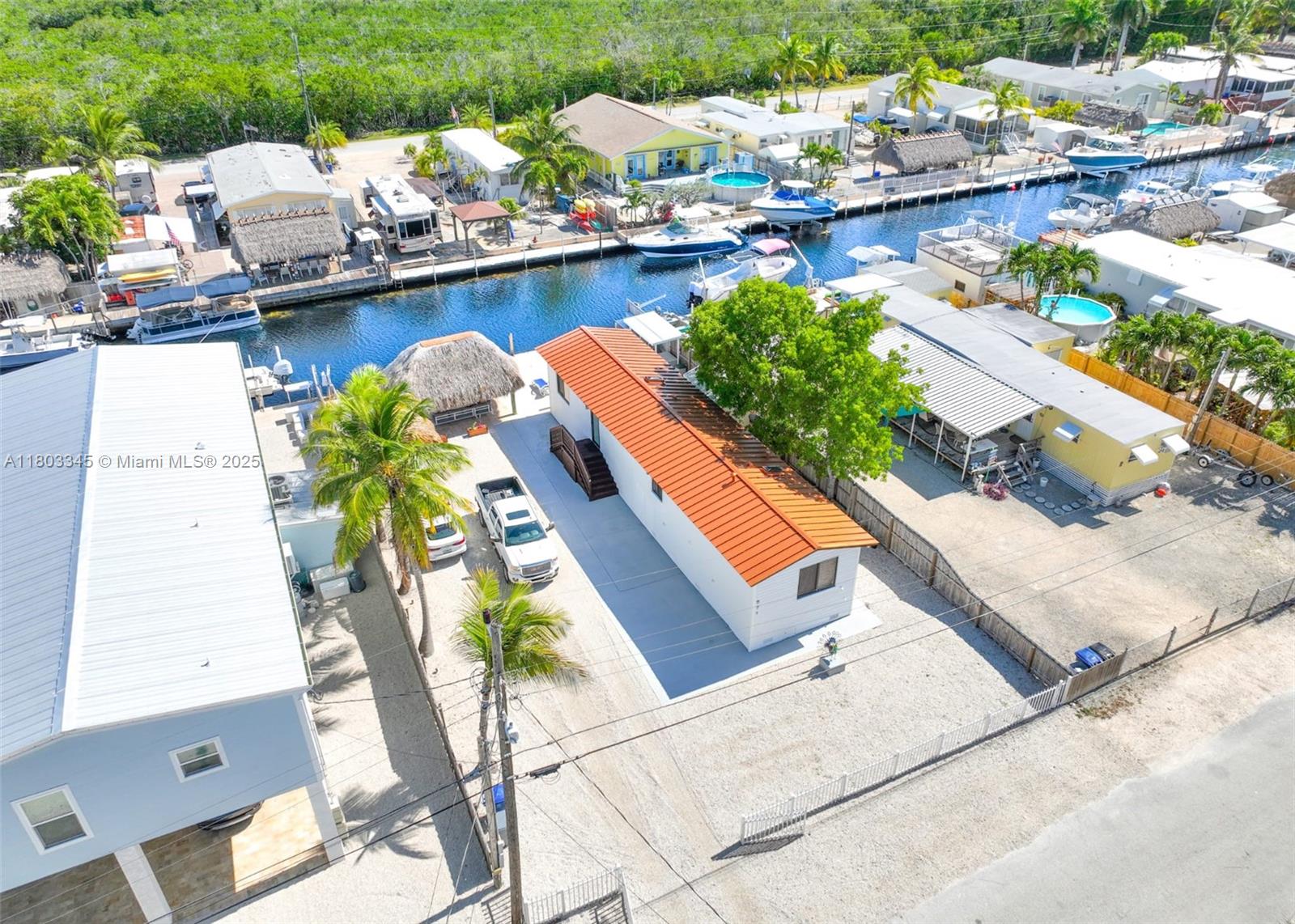 271 Lance Lane Key Largo, FL 33037 - Photo 2 of 33 a view of swimming pool with outdoor seating