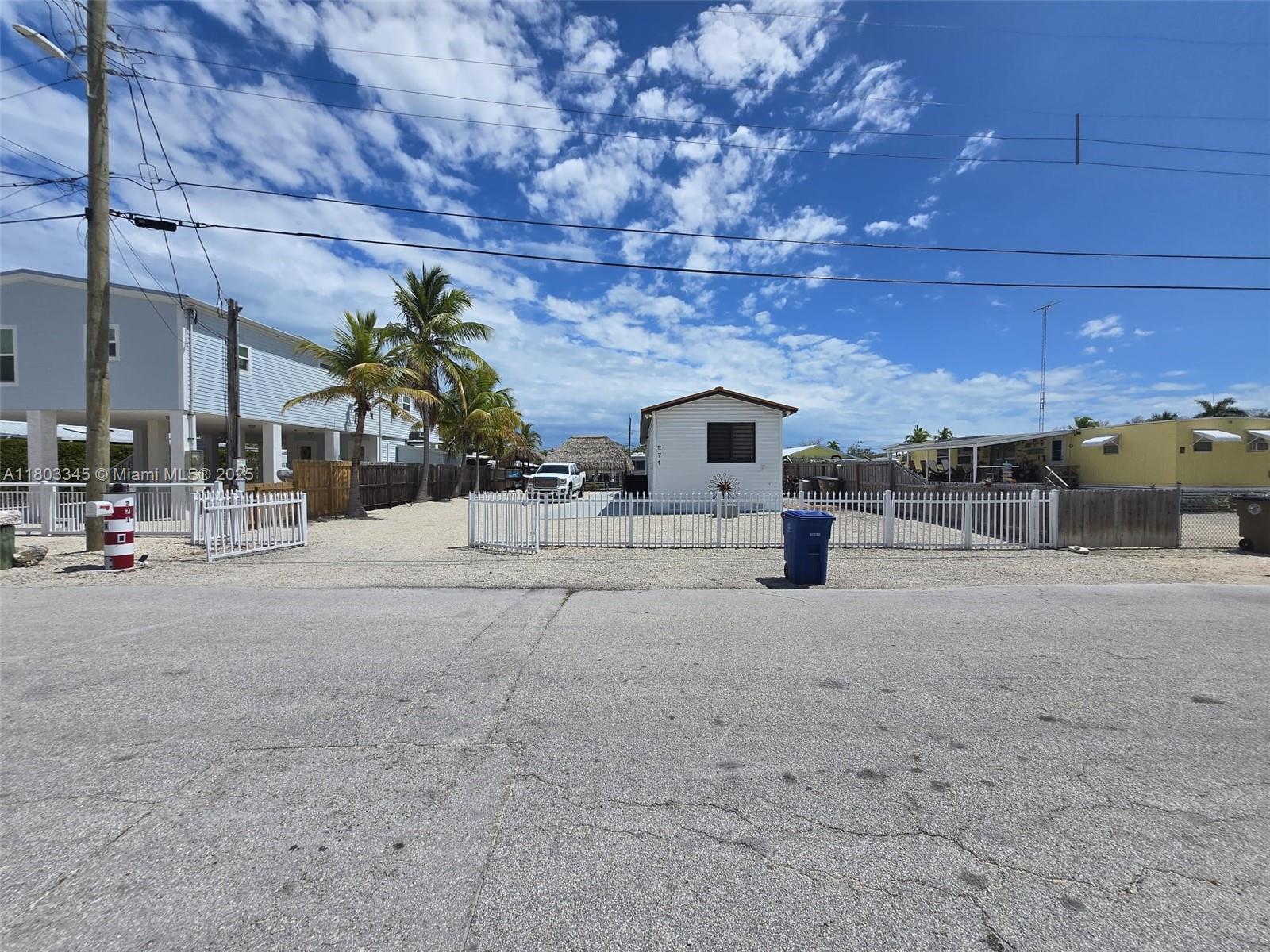 271 Lance Lane Key Largo, FL 33037 - Photo 7 of 33 a view of road with card