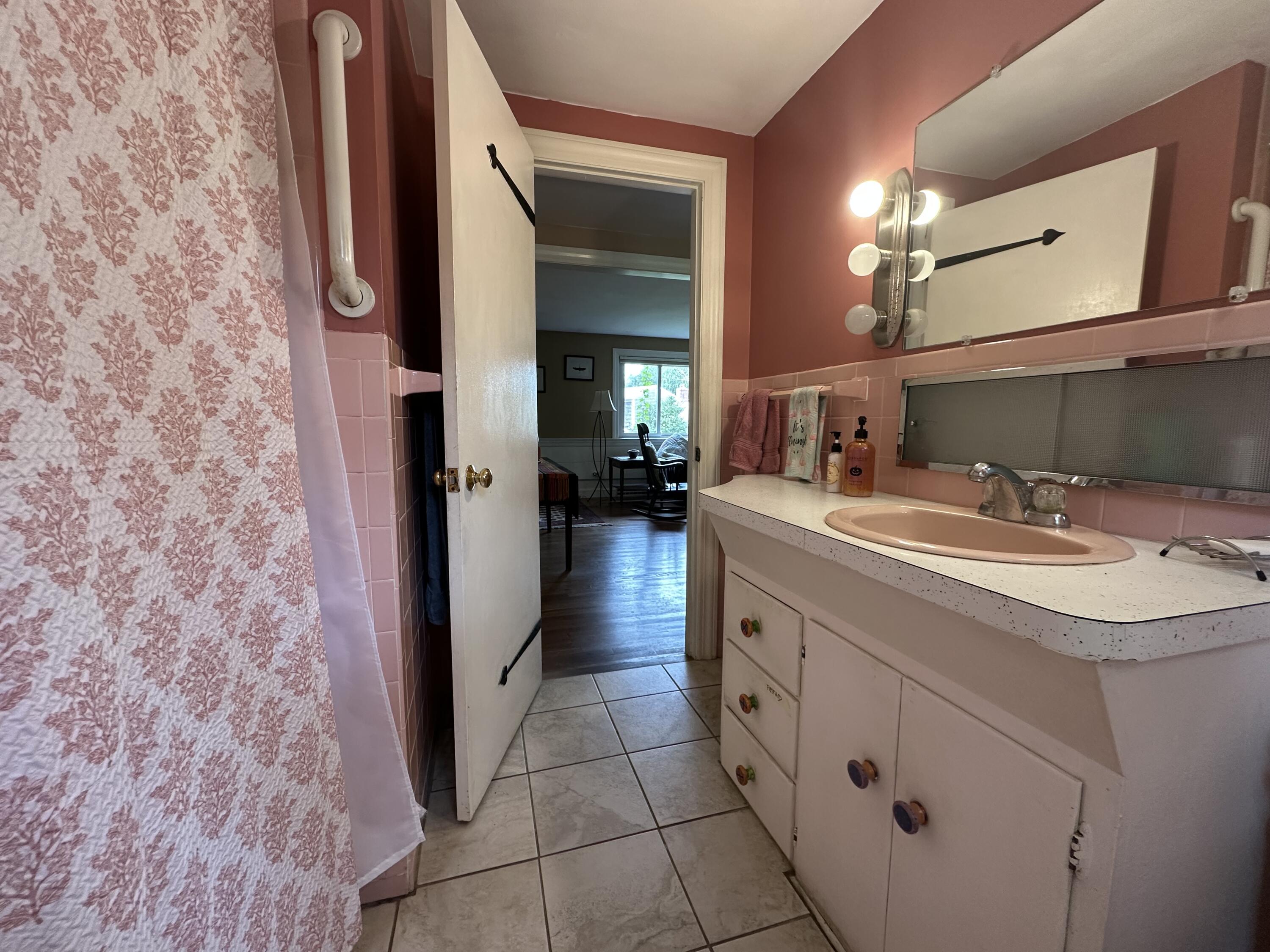 55 Monument View Road East Dennis, MA 02660 - Photo 18 of 40 a bathroom with a sink and a mirror