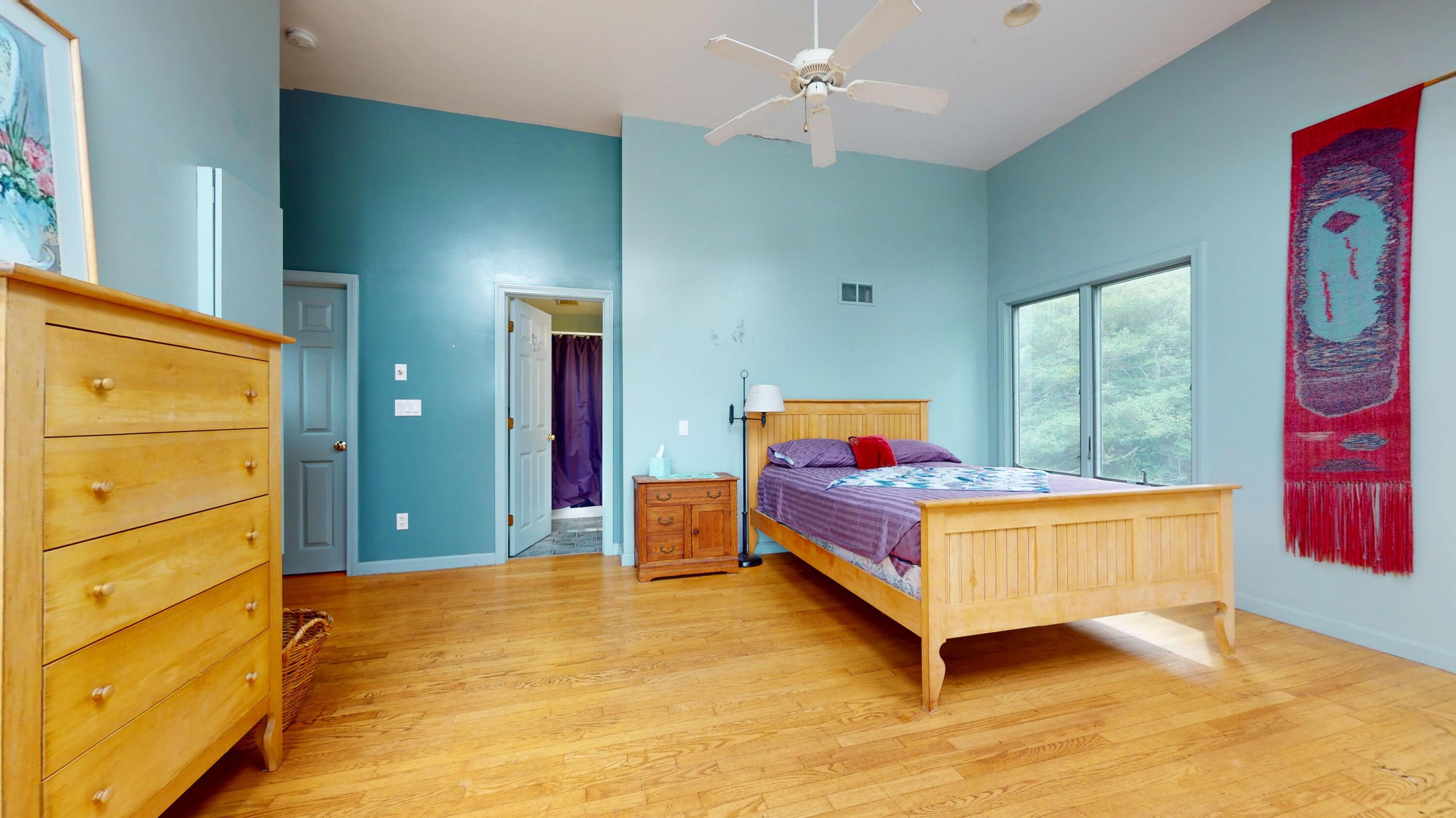 55 Monument View Road East Dennis, MA 02660 - Photo 26 of 40 a bed room with a bed and a window