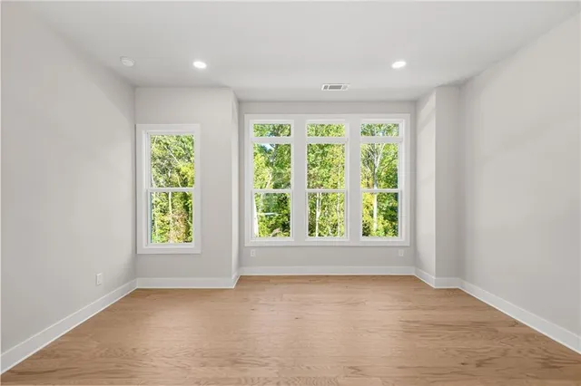 an empty room with windows