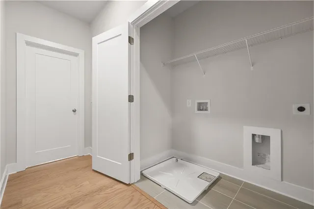 a view of a balcony with wooden floor and fence