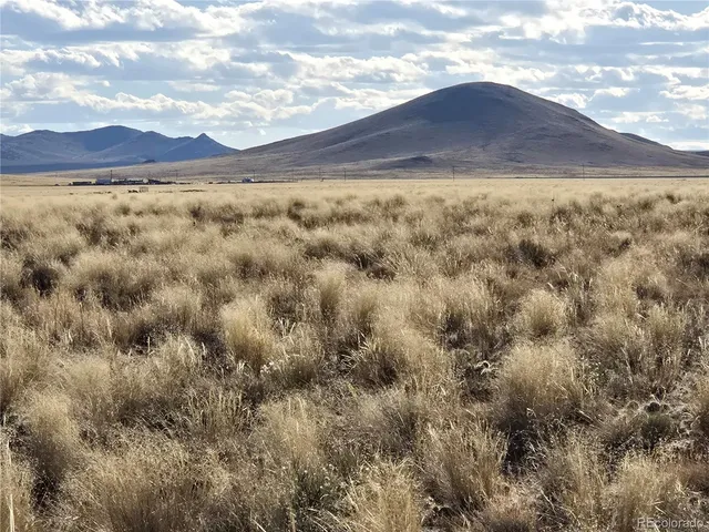 a view of an outdoor space and mountain view