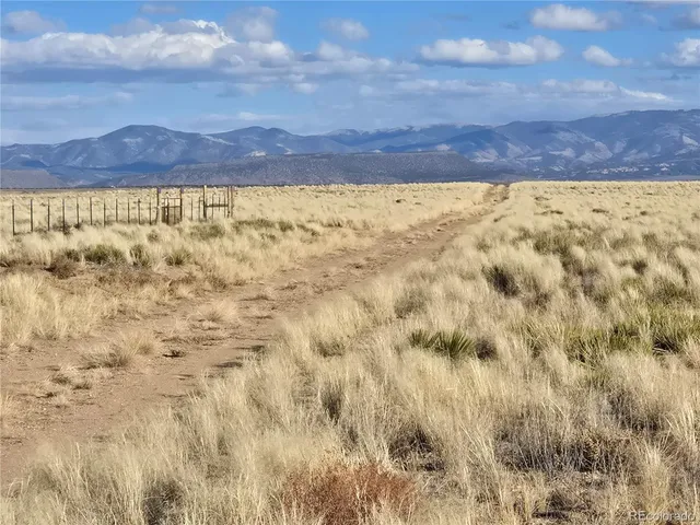 a view of ocean and mountain