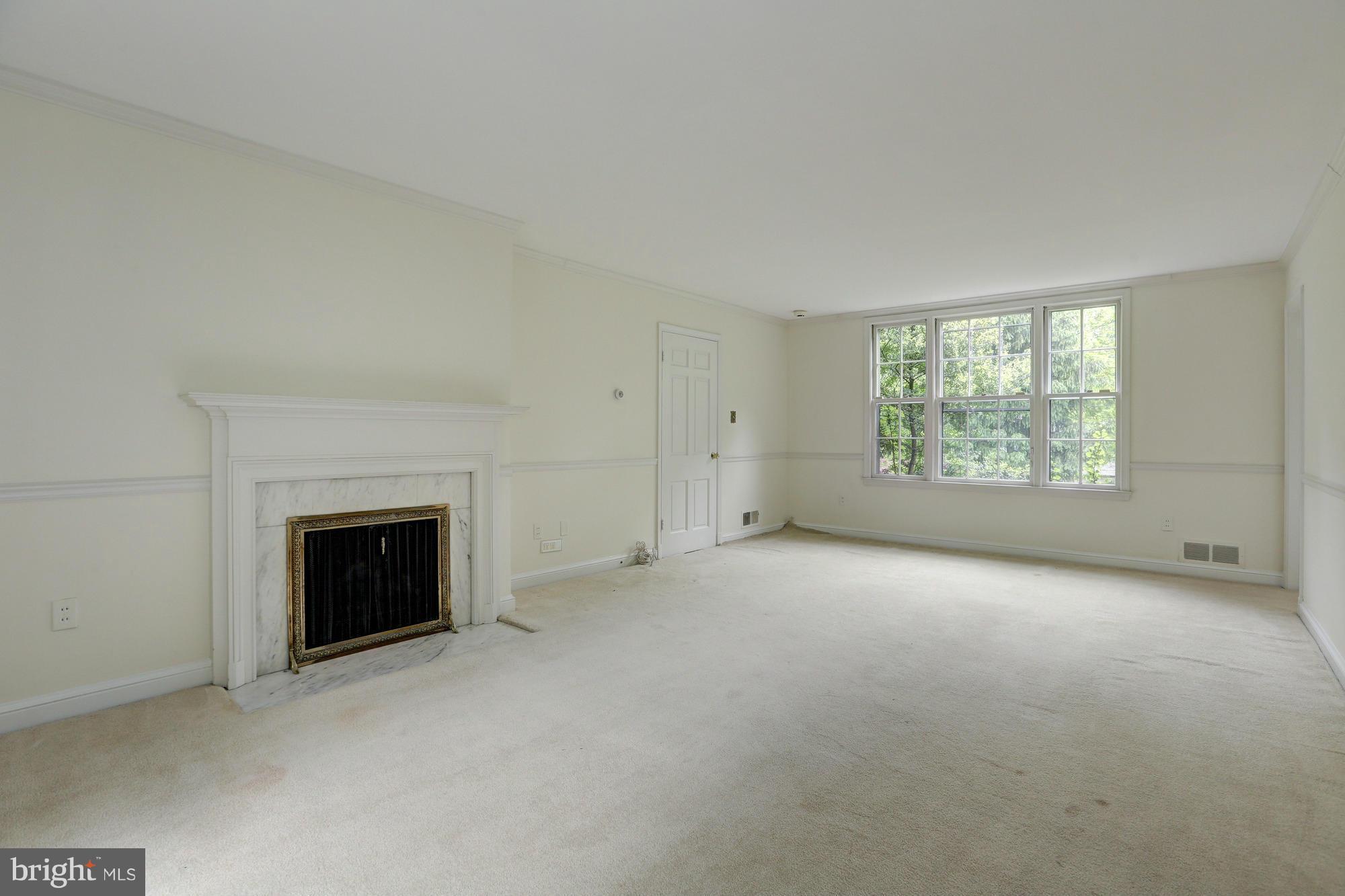 4911 Loughboro Road Northwest Washington, DC 20016 - Photo 14 of 28 First Floor Master Suite with Fireplace