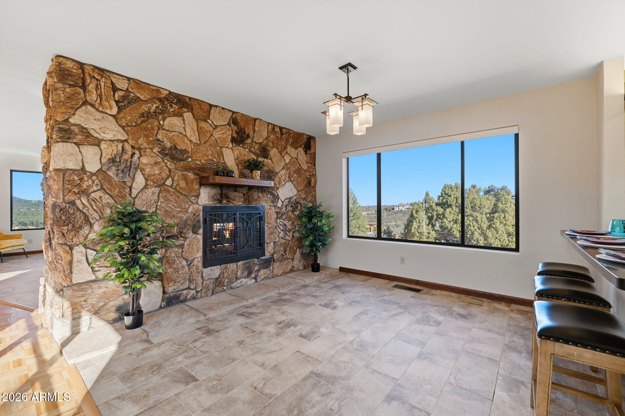220 High Chaparral Loop Prescott, AZ 86303 - Photo 14 of 42 a living room with furniture and a fireplace