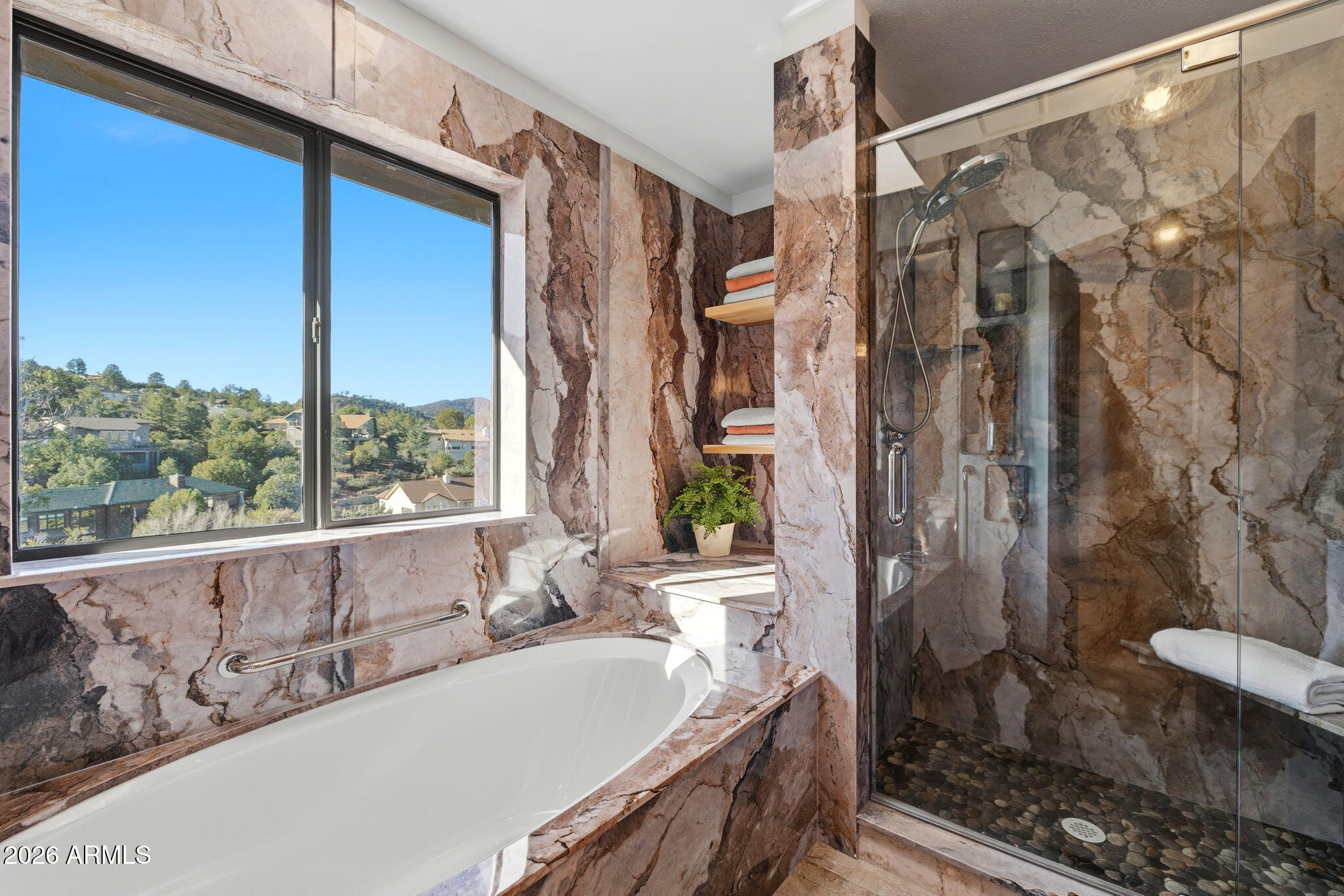 220 High Chaparral Loop Prescott, AZ 86303 - Photo 22 of 42 a bathroom with a bathtub and a shower