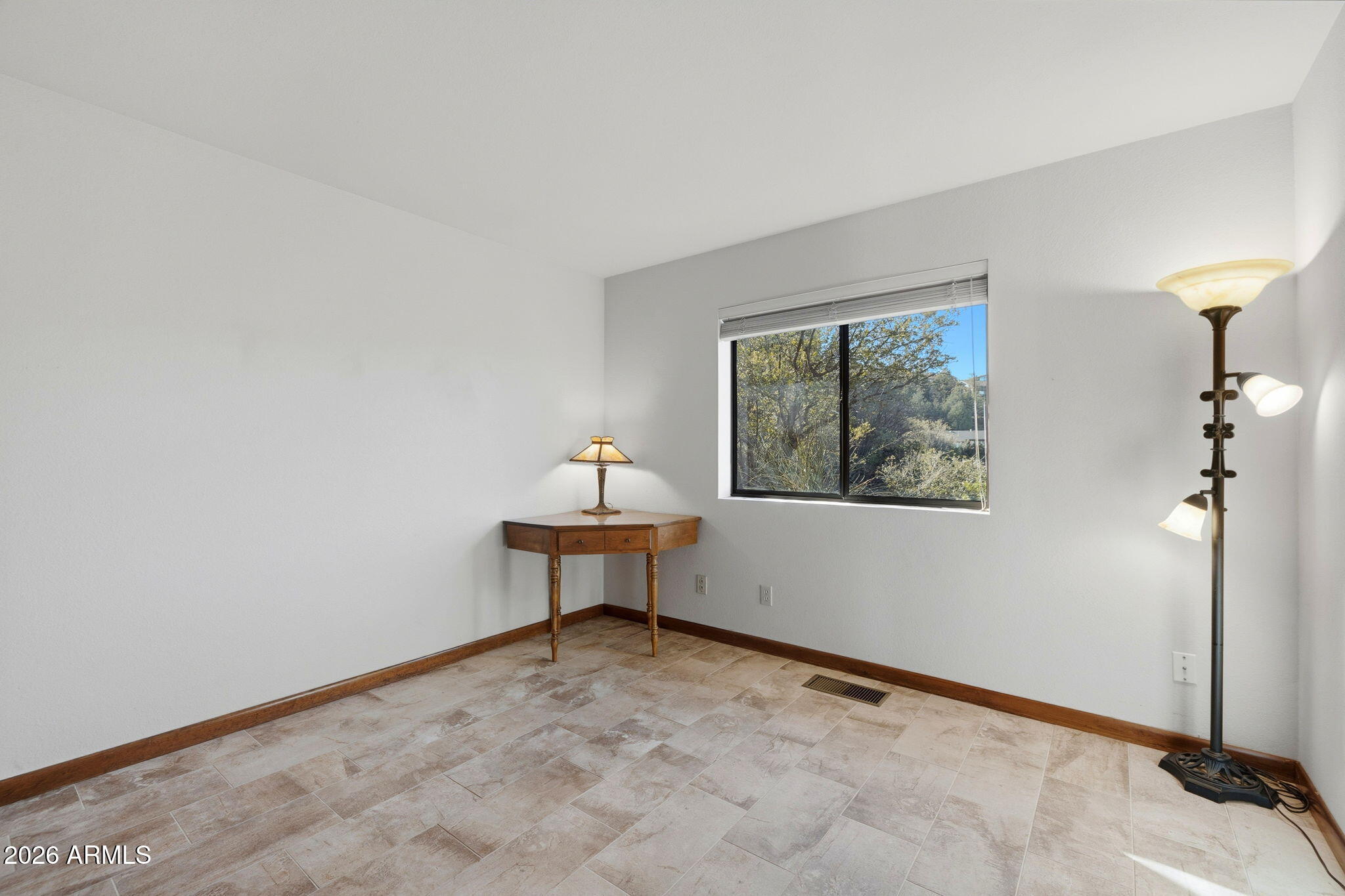 220 High Chaparral Loop Prescott, AZ 86303 - Photo 24 of 42 a view of a room with a window and wooden floor