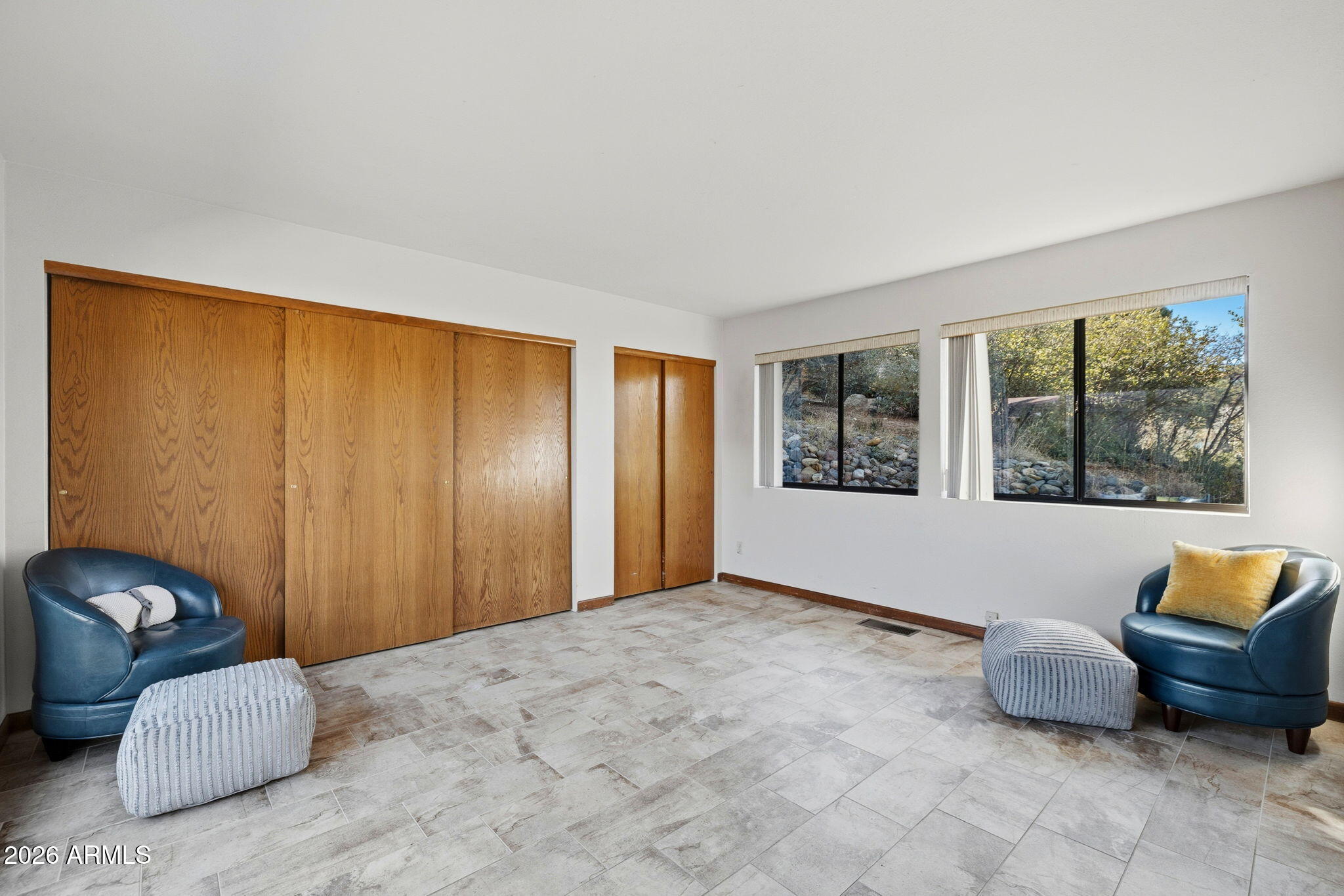 220 High Chaparral Loop Prescott, AZ 86303 - Photo 25 of 42 a bedroom with a bed and glass window