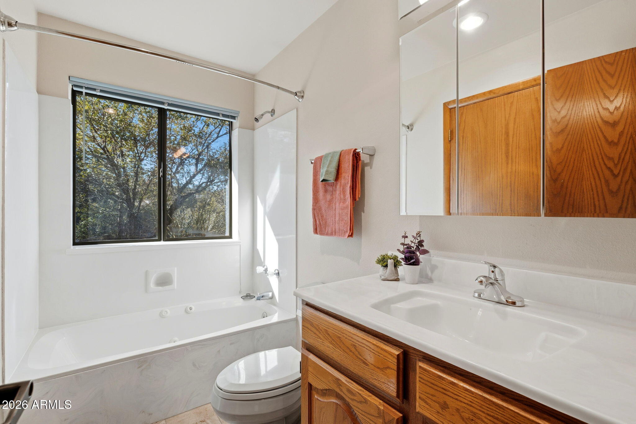 220 High Chaparral Loop Prescott, AZ 86303 - Photo 27 of 42 a bathroom with a granite countertop sink toilet and shower