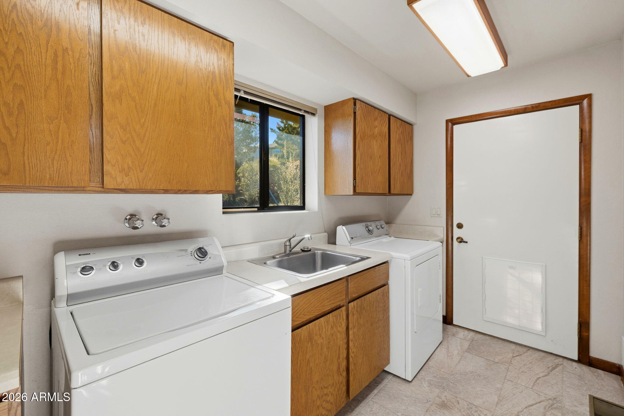 220 High Chaparral Loop Prescott, AZ 86303 - Photo 29 of 42 a utility room with dryer and washer