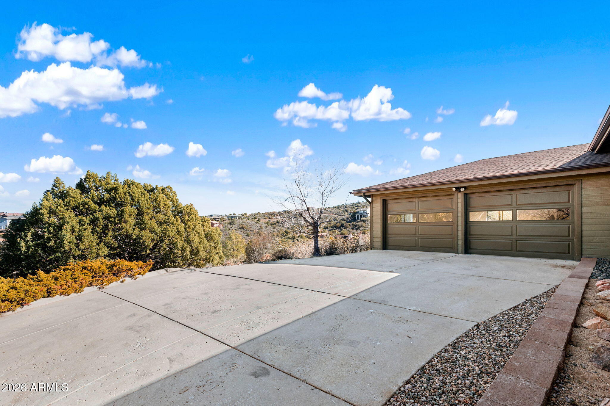 220 High Chaparral Loop Prescott, AZ 86303 - Photo 34 of 42 a view of a house with a yard