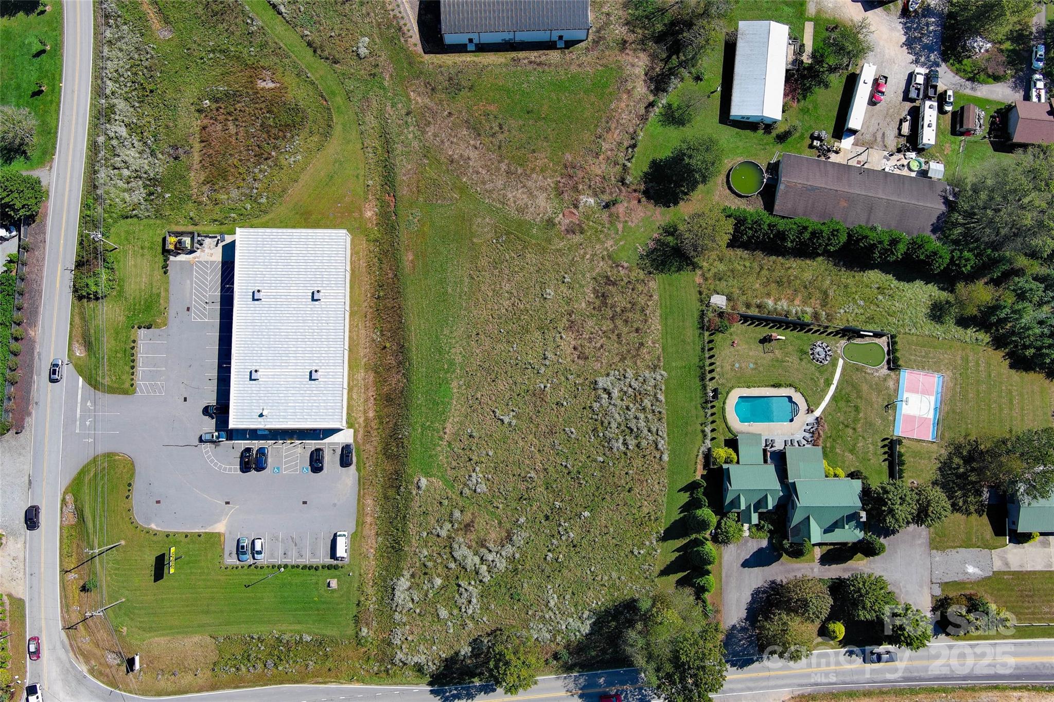 Tbd Glenn Bridge Road Arden, NC 28704 - Photo 3 of 20 an aerial view of a house with outdoor space and a lake view