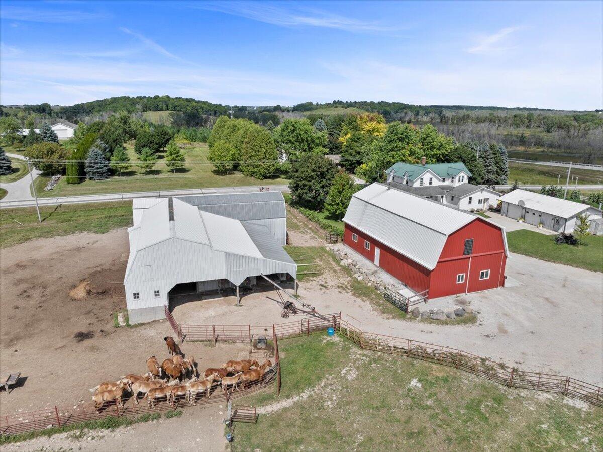 W1731 Kiel Road Elkhart Lake, WI 53020 - Photo 41 of 50 Pasture and barn