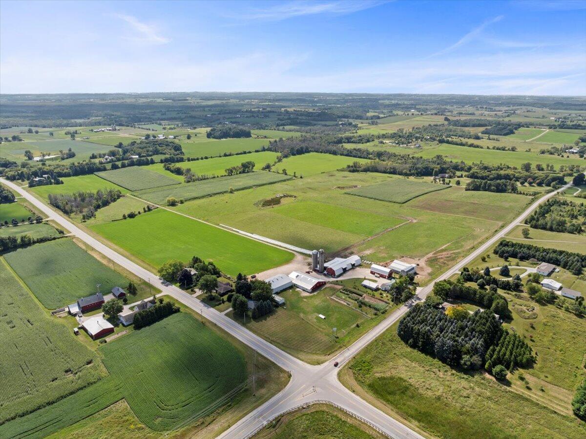 W1731 Kiel Road Elkhart Lake, WI 53020 - Photo 44 of 50 Drone photo of farmland