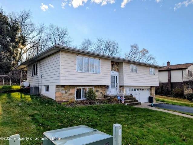 a view of a yard in front of house
