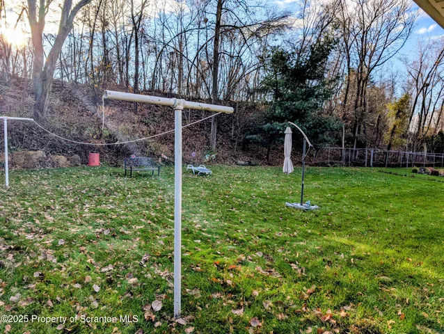 a view of a backyard with a slide