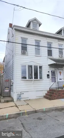 a view of a building with a street