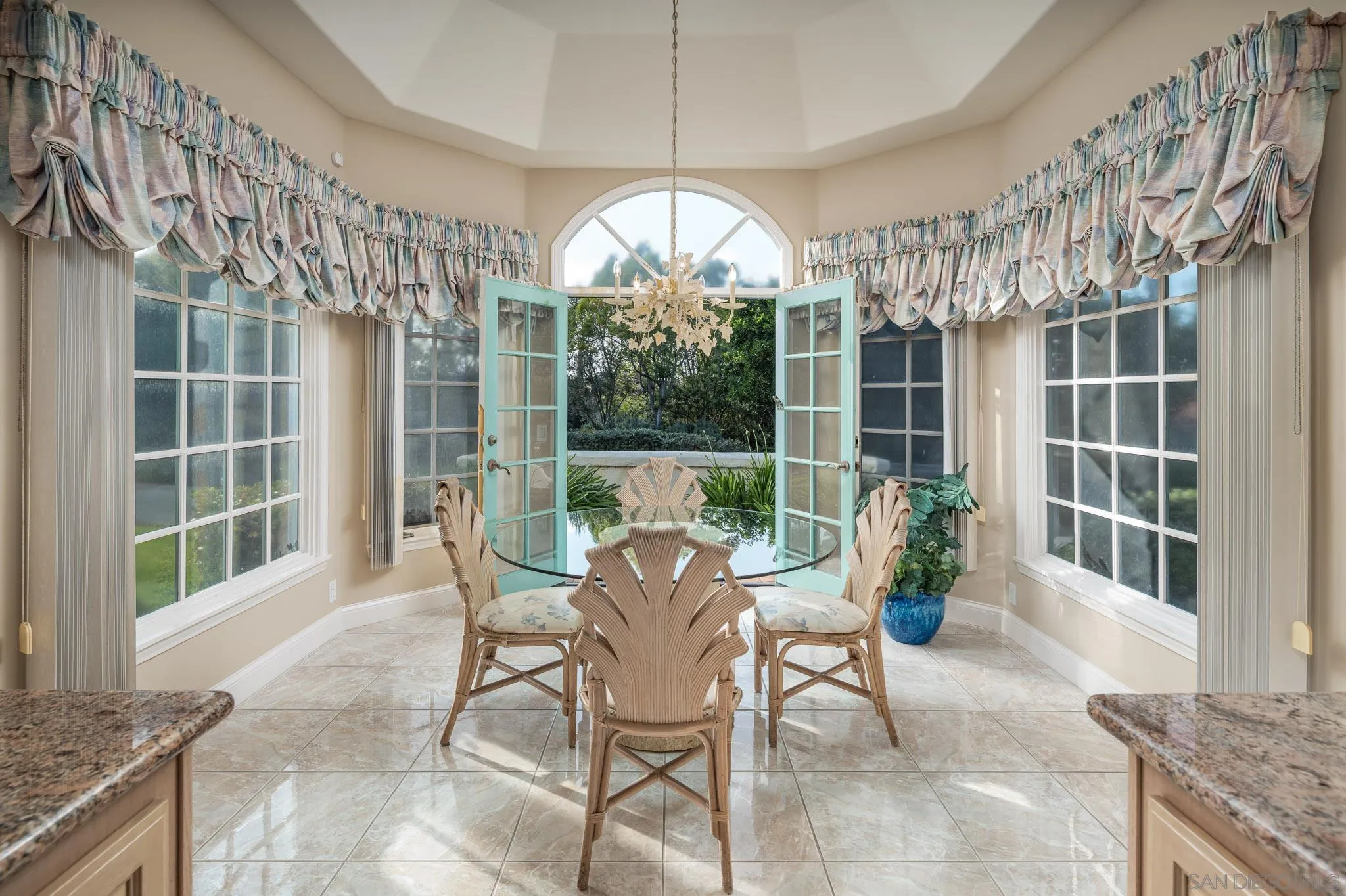 18221 Via Ascenso Rancho Santa Fe, CA 92067 - Photo 14 of 37 a view of a dining room with furniture window and outside view