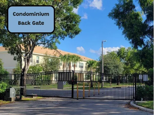 an aerial view of a house with yard swimming pool and outdoor seating