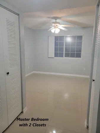 a bathroom with a toilet a sink and bathtub