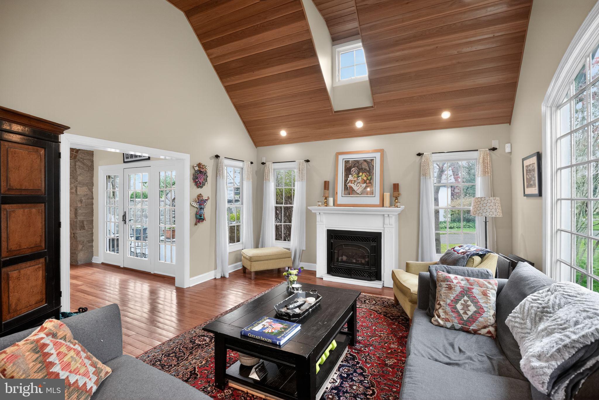 221 North Bent Road Wyncote, PA 19095 - Photo 4 of 42 Great Room with vaulted ceiling and fireplace