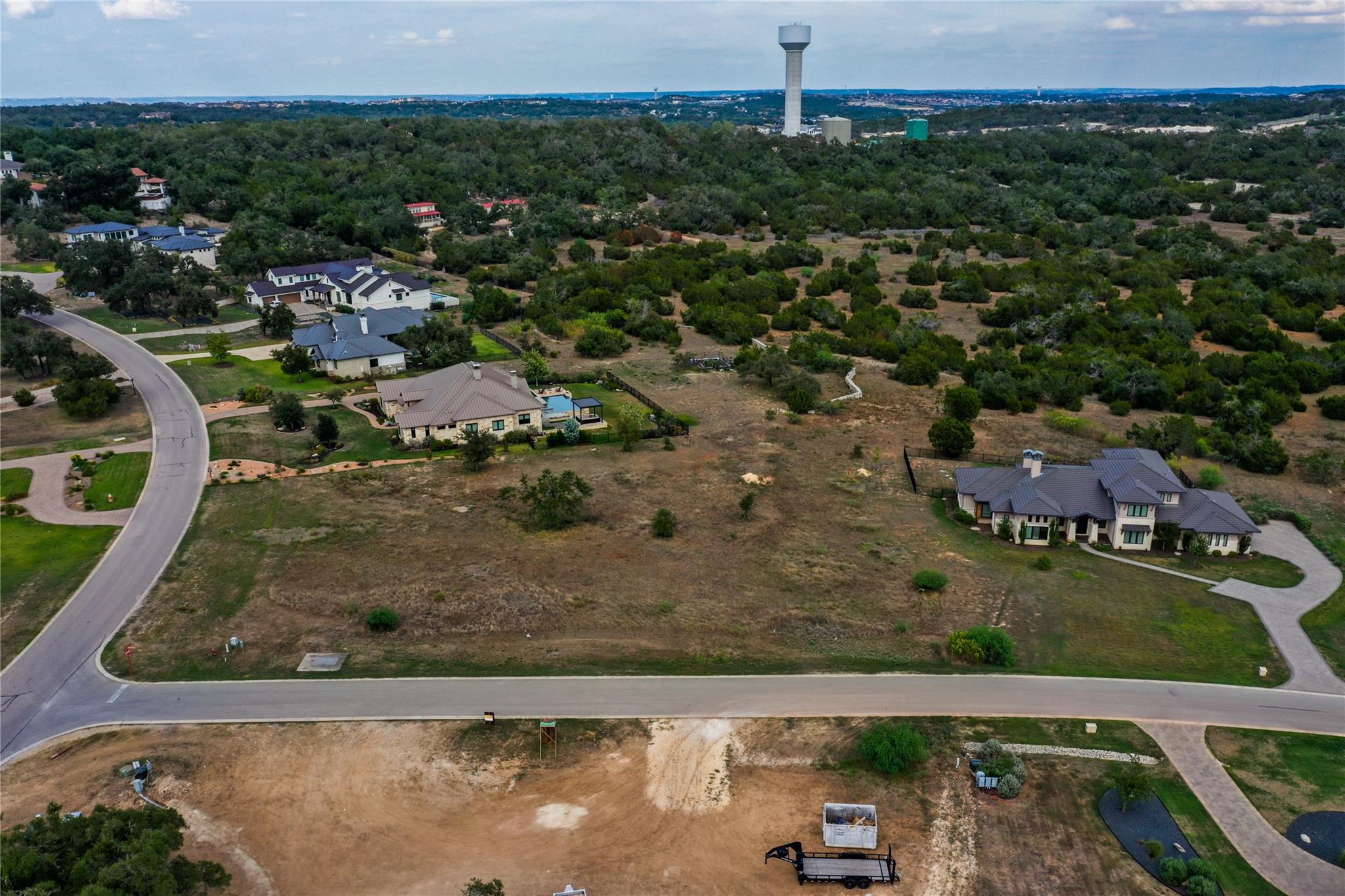 8501 Springdale Ridge Cove Austin, TX 78738 - Photo 3 of 5 an aerial view of a house with a yard