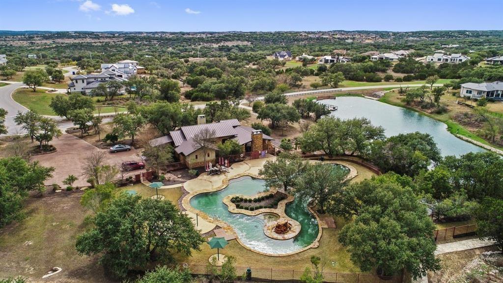 8501 Springdale Ridge Cove Austin, TX 78738 - Photo 5 of 5 an aerial view of a residential houses with outdoor space