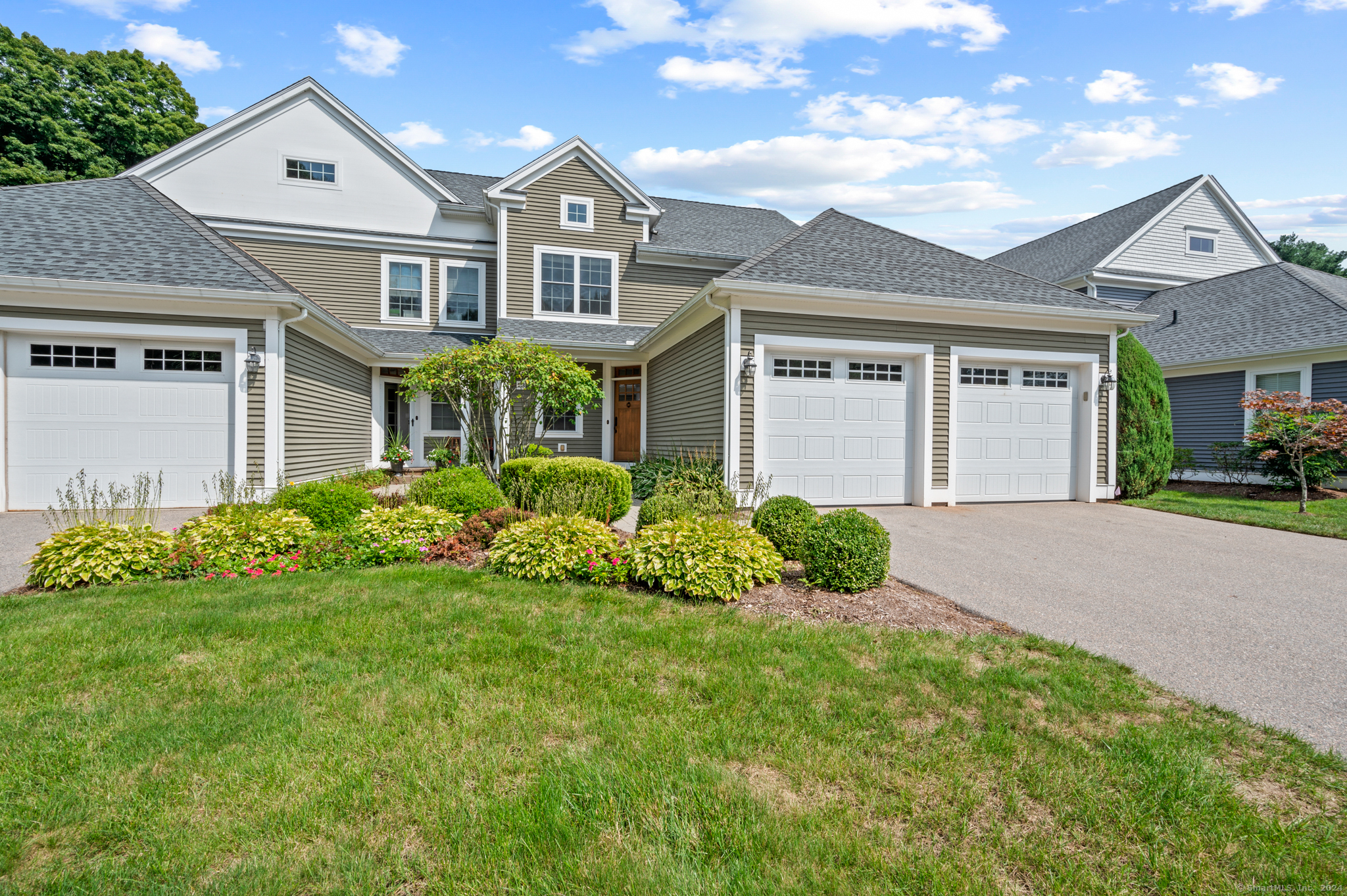 13 Tryon Farm Road, Unit 13 Glastonbury, CT 06073 - Photo 1 of 1 a front view of a house with a yard and garage
