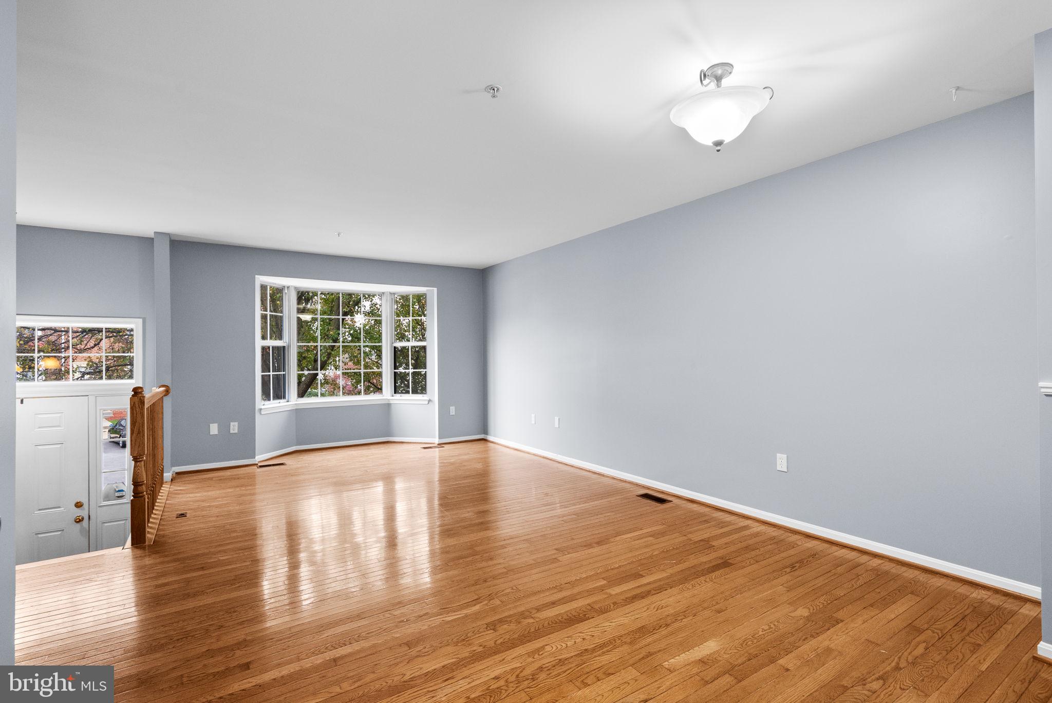1346 Waterway Court, Unit 186 Curtis Bay, MD 21226 - Photo 11 of 44 a view of empty room with wooden floor and fan