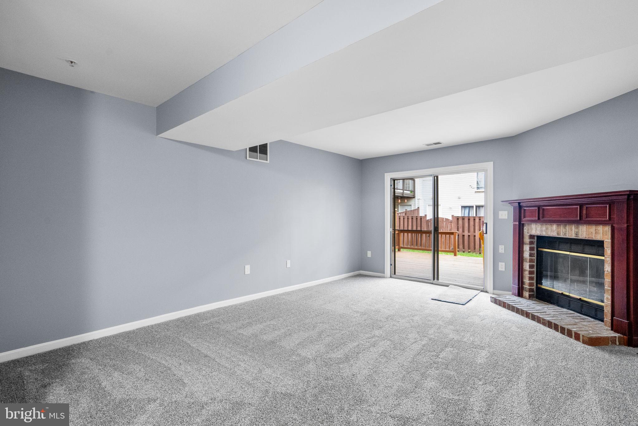 1346 Waterway Court, Unit 186 Curtis Bay, MD 21226 - Photo 29 of 44 a view of empty room with a fireplace