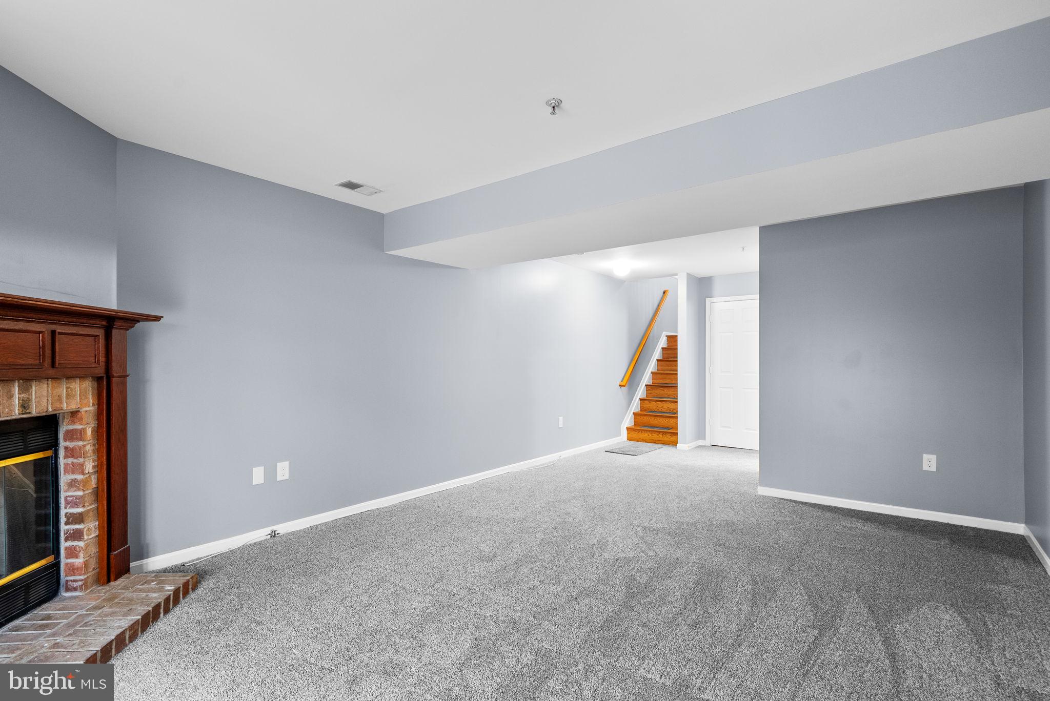 1346 Waterway Court, Unit 186 Curtis Bay, MD 21226 - Photo 30 of 44 a view of an empty room with wooden floor and a window