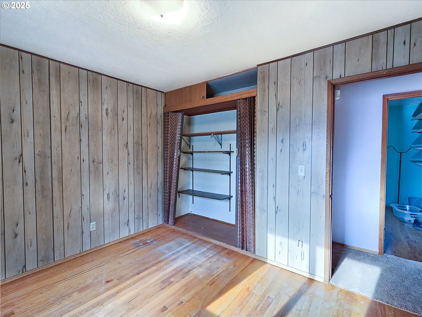 7750 North Decatur Street Portland, OR 97203 - Photo 17 of 28 a view of empty room with wooden floor