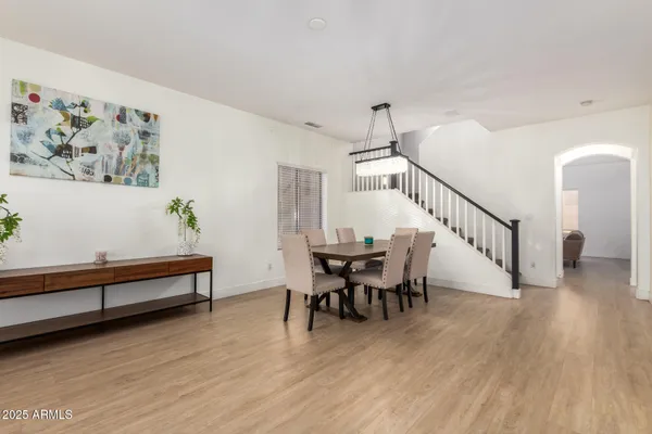 a view of a livingroom with furniture and wooden floor